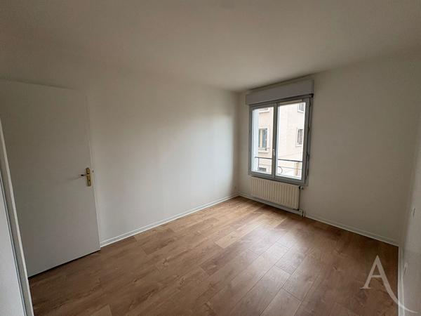 Appartement 3 pièces avec balcon, cave et box - Résidence sécurisée