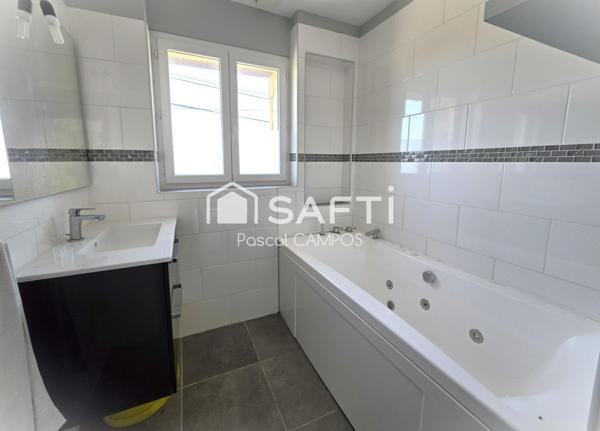 Maison de village 3 chambres avec cour et garage