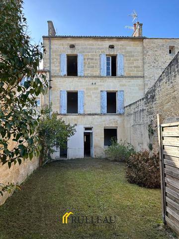 CENTRE-VILLE: Immeuble avec garage et jardin Détails des diagnostics énergétiques
