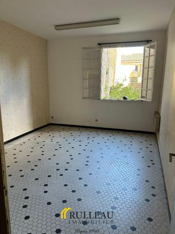 CENTRE-VILLE: Immeuble avec garage et jardin Détails des diagnostics énergétiques