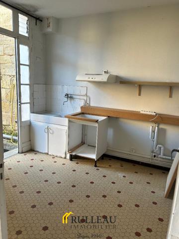CENTRE-VILLE: Immeuble avec garage et jardin Détails des diagnostics énergétiques