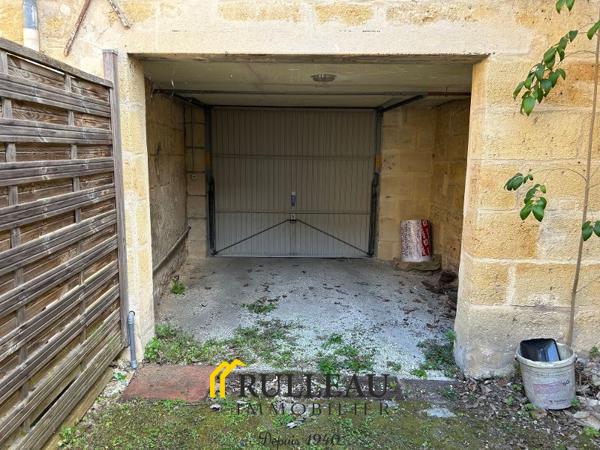 CENTRE-VILLE: Immeuble avec garage et jardin Détails des diagnostics énergétiques