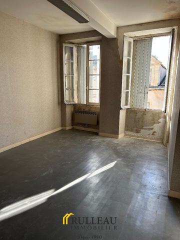 CENTRE-VILLE: Immeuble avec garage et jardin Détails des diagnostics énergétiques
