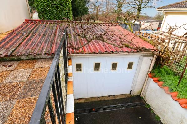 Maison de plain Pied de 104 m² - 7 pièces - 5 chambres - Véranda - Garage - sur parcelle de Terrain Clos de 1500 m² - MAGNAC LAVAL (87)
