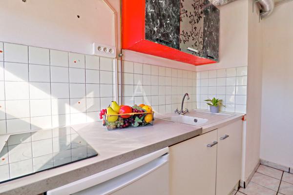 APPARTEMENT AVEC BALCON CAVE ET ASCENSEUR PROCHE CENTRE VILLE