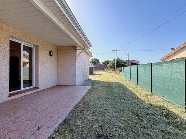 Maison T5 de plain-pied avec 4 chambres et jardin