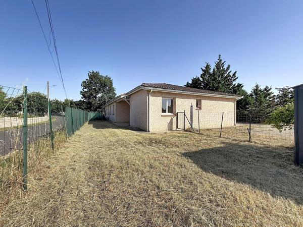 Maison T5 de plain-pied avec 4 chambres et jardin