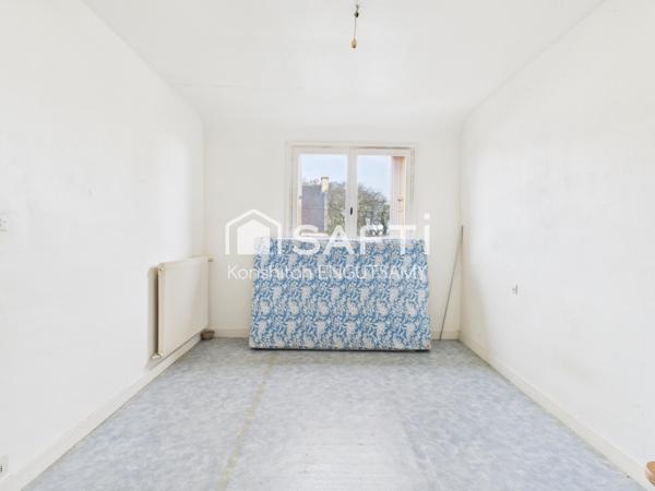 Maison familiale de 113 m² avec jardin – Beau potentiel à Plouigneau