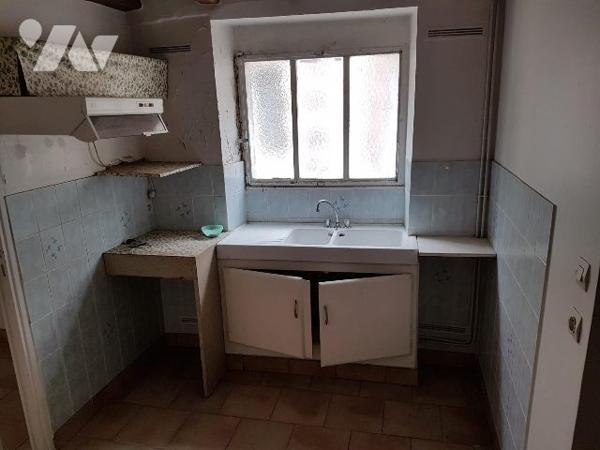 MAISON AVEC DEUX LOGEMENTS