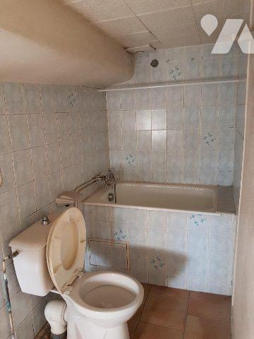 MAISON AVEC DEUX LOGEMENTS