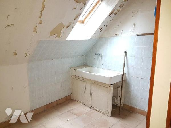 MAISON AVEC DEUX LOGEMENTS