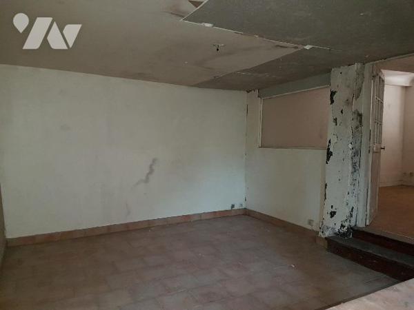 MAISON AVEC DEUX LOGEMENTS