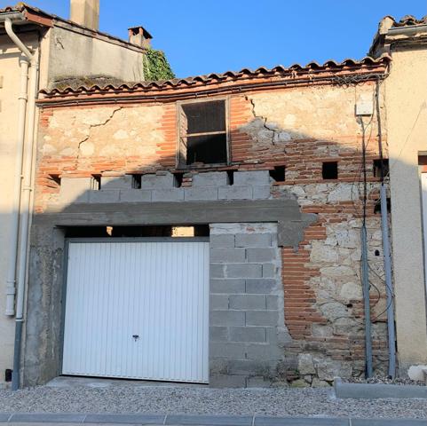 garage et terrain en zone urbaine