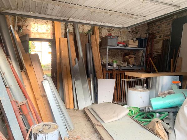 garage et terrain en zone urbaine