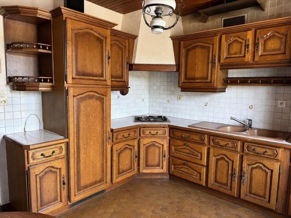 Maison, grand terrain et 110 m² de sous-sol