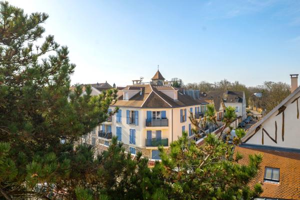 5 pièces 105 m² - double balcon - parking - cave