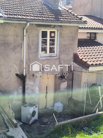 Maison de ville avec jardin, garage terrasse, atelier