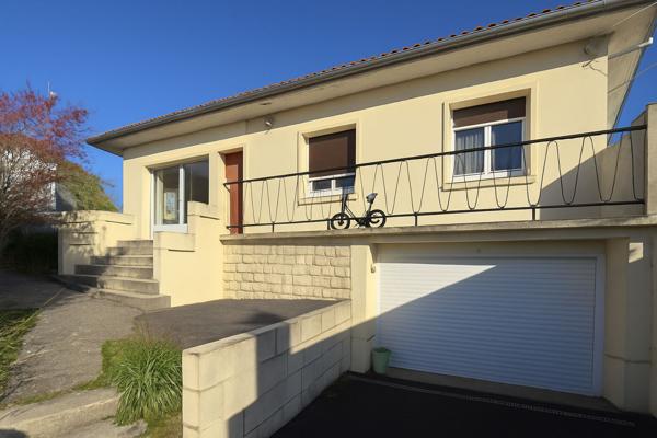 Maison 90m² 3 chambres, 2 garages à proximité des écoles et commerces