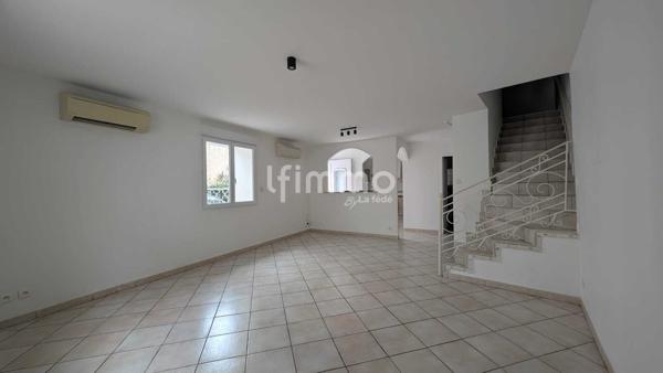 maison avec un studio loué