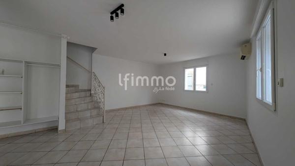 maison avec un studio loué