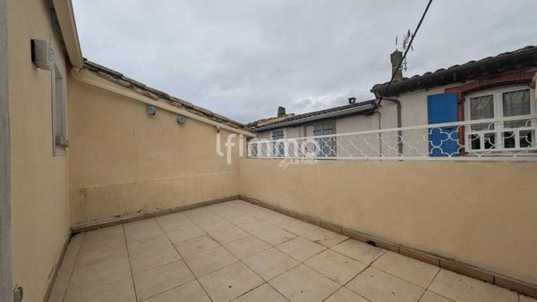 maison avec un studio loué