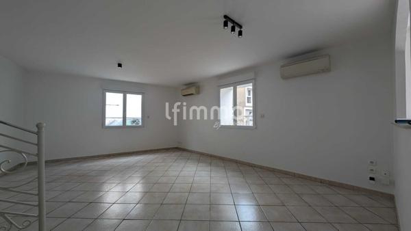 maison avec un studio loué