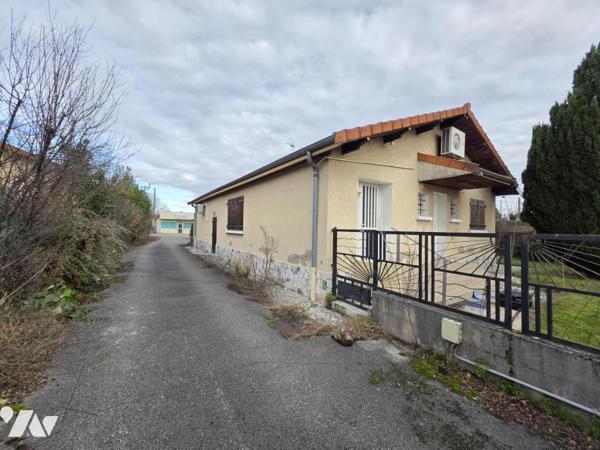 Tènement immobilier maison d'habitation et bâtiment à usage artisanal