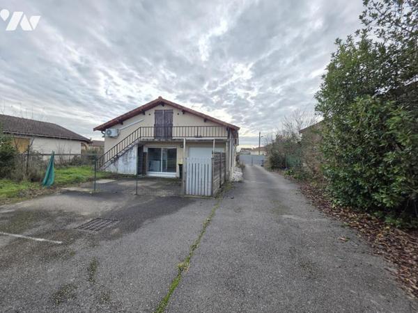 Tènement immobilier maison d'habitation et bâtiment à usage artisanal