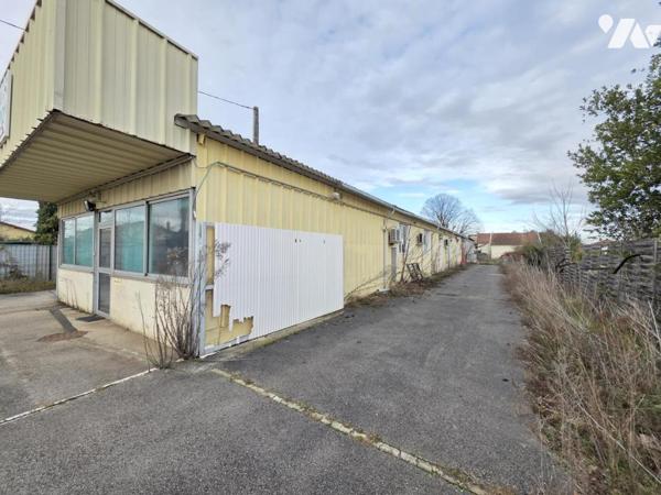 Tènement immobilier maison d'habitation et bâtiment à usage artisanal