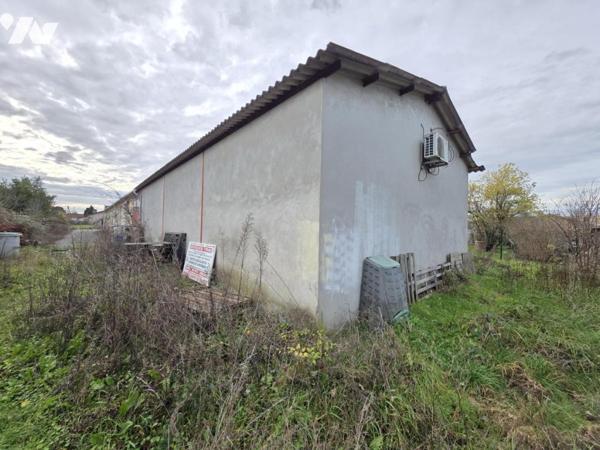 Tènement immobilier maison d'habitation et bâtiment à usage artisanal