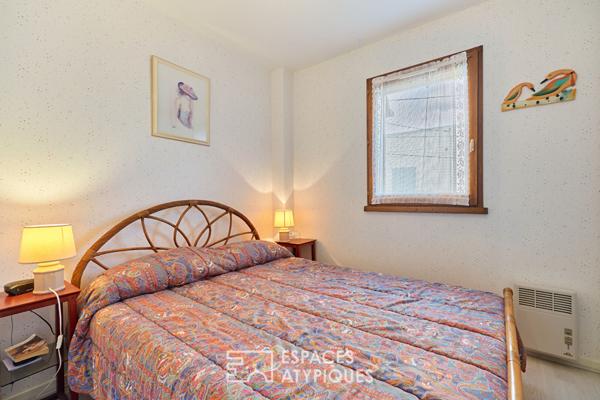 Cottage en triplex avec son jardin