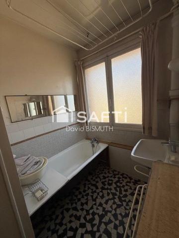 APPARTEMENT 4 PIECES 3 CHAMBRES DE 78 M2 AVEC BOX ET CAVE AU SOUS SOL