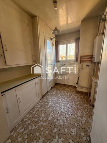 APPARTEMENT 4 PIECES 3 CHAMBRES DE 78 M2 AVEC BOX ET CAVE AU SOUS SOL