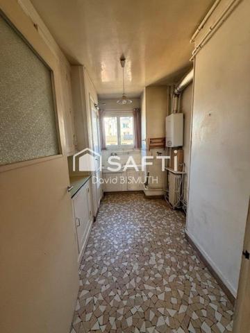 APPARTEMENT 4 PIECES 3 CHAMBRES DE 78 M2 AVEC BOX ET CAVE AU SOUS SOL