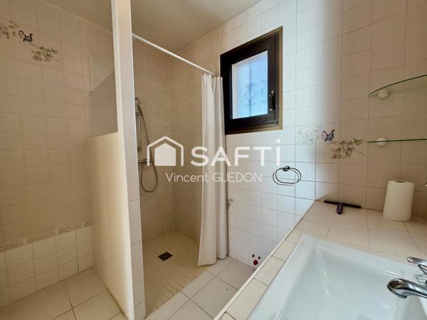 T3 en Rez-de-Jardin avec Double Garage et Jardin Privatif