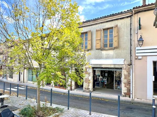 IMMEUBLE AVEC LOCAL COMMERCIAL ET 3 APPARTEMENTS