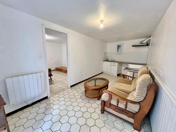 IMMEUBLE AVEC LOCAL COMMERCIAL ET 3 APPARTEMENTS