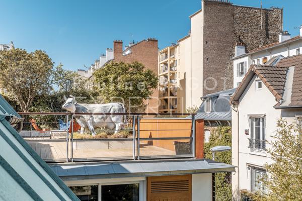 Courbevoie (92400) MAISON D'ARCHITECTE COURBEVOIE 262 M2 - Rooftop de 67 m2 et jardin-patio de 58 m2