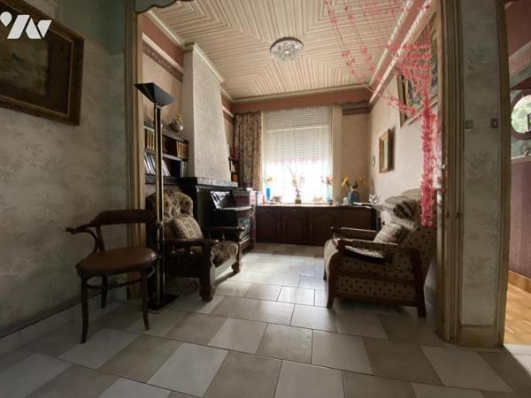 A VENDRE MAISON A RENOVER AVEC COUR ET GRAND GARAGE