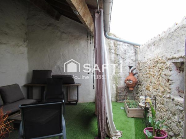 A saisir : 2 appartements (T3/T2) + garage de 100m2