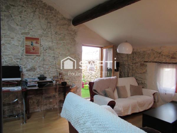 A saisir : 2 appartements (T3/T2) + garage de 100m2