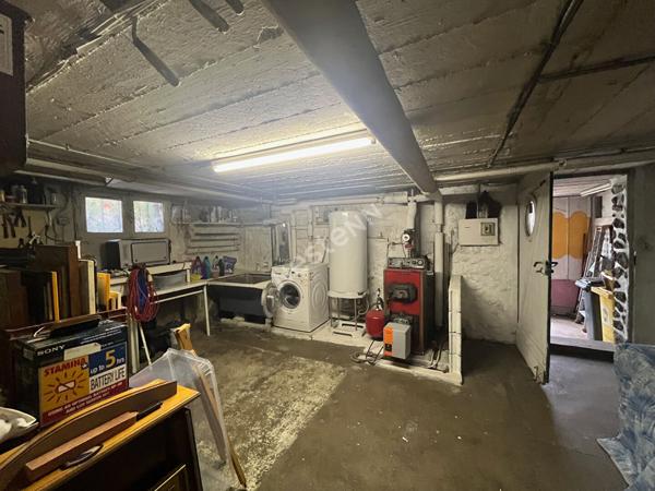 Maison des années 30 en briques avec jardin et garages- Charme et Potentiel sur la colline de Puteaux