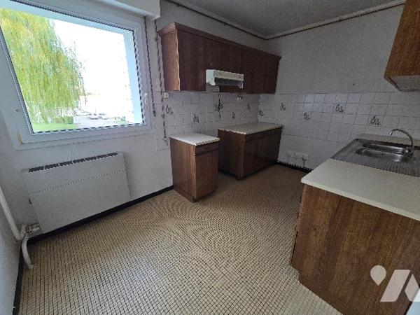 Appartement F4 à rénover - Parking - Ascenseur - CHAMPIGNEULLES