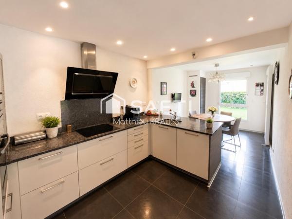 Rez-de-jardin, terrasse 50m² et jardin privatif