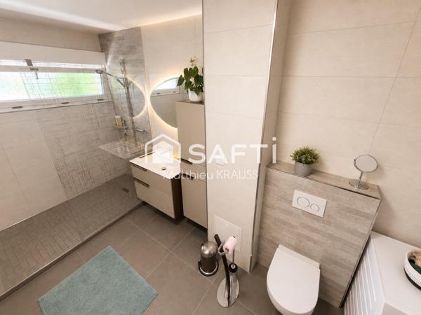 Rez-de-jardin, terrasse 50m² et jardin privatif