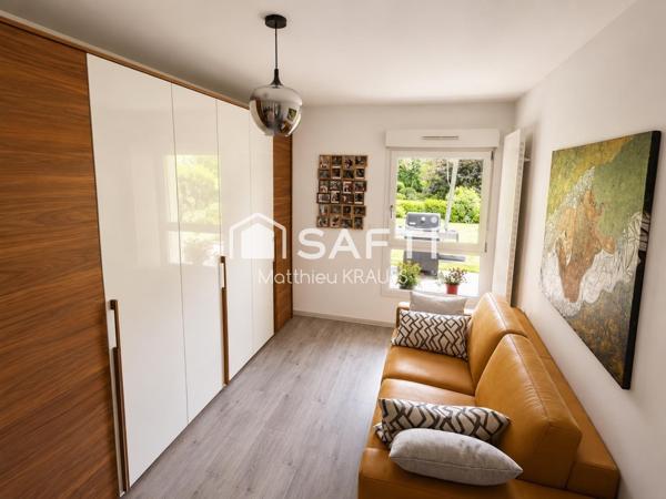 Rez-de-jardin, terrasse 50m² et jardin privatif