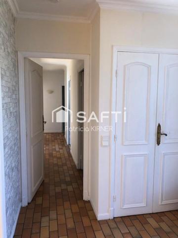 Maison plain pied T5 avec garage et jardin.