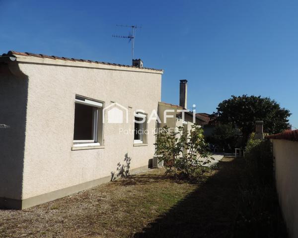 Maison plain pied T5 avec garage et jardin.