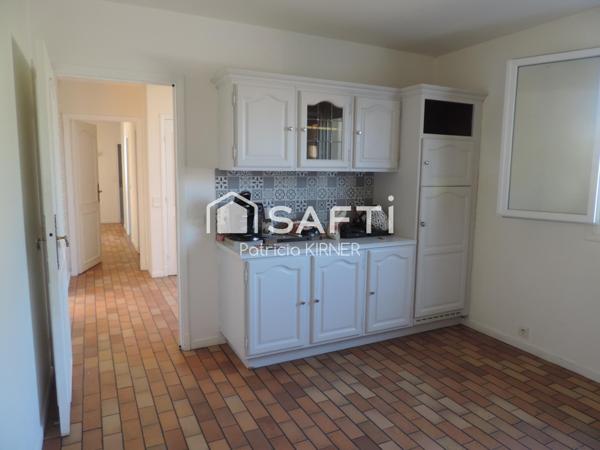 Maison plain pied T5 avec garage et jardin.