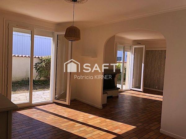 Maison plain pied T5 avec garage et jardin.